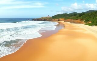 Panorama Pantai Nganteb Malang dengan Pura di kejauhan dan ombak besar khas Samudera Hindia