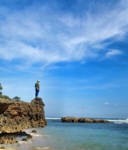 Berdiri di atas batu karang Berdiri di atas batu karang