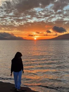 Foto dengan latar belakang keindahan sunset yang memukau Foto dengan latar belakang keindahan sunset yang memukau
