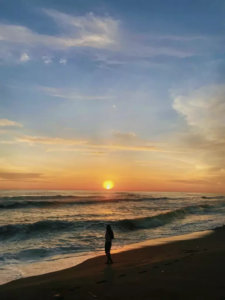 Panorama Pantai Goa Cemara saat senja